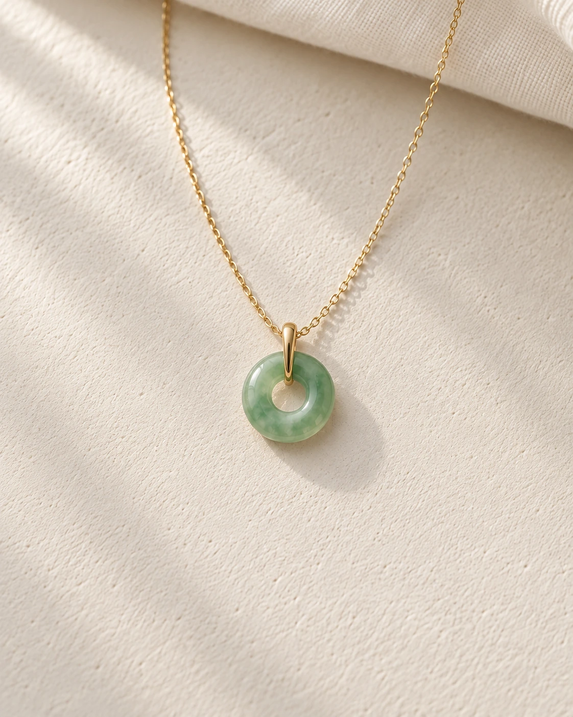 YÙ · Circle jadeite necklace concept; AI-generated image