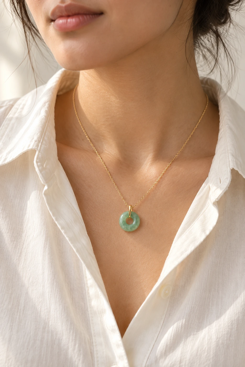 YÙ Circle jadeite necklace concept worn with an ivory shirt; AI-generated image